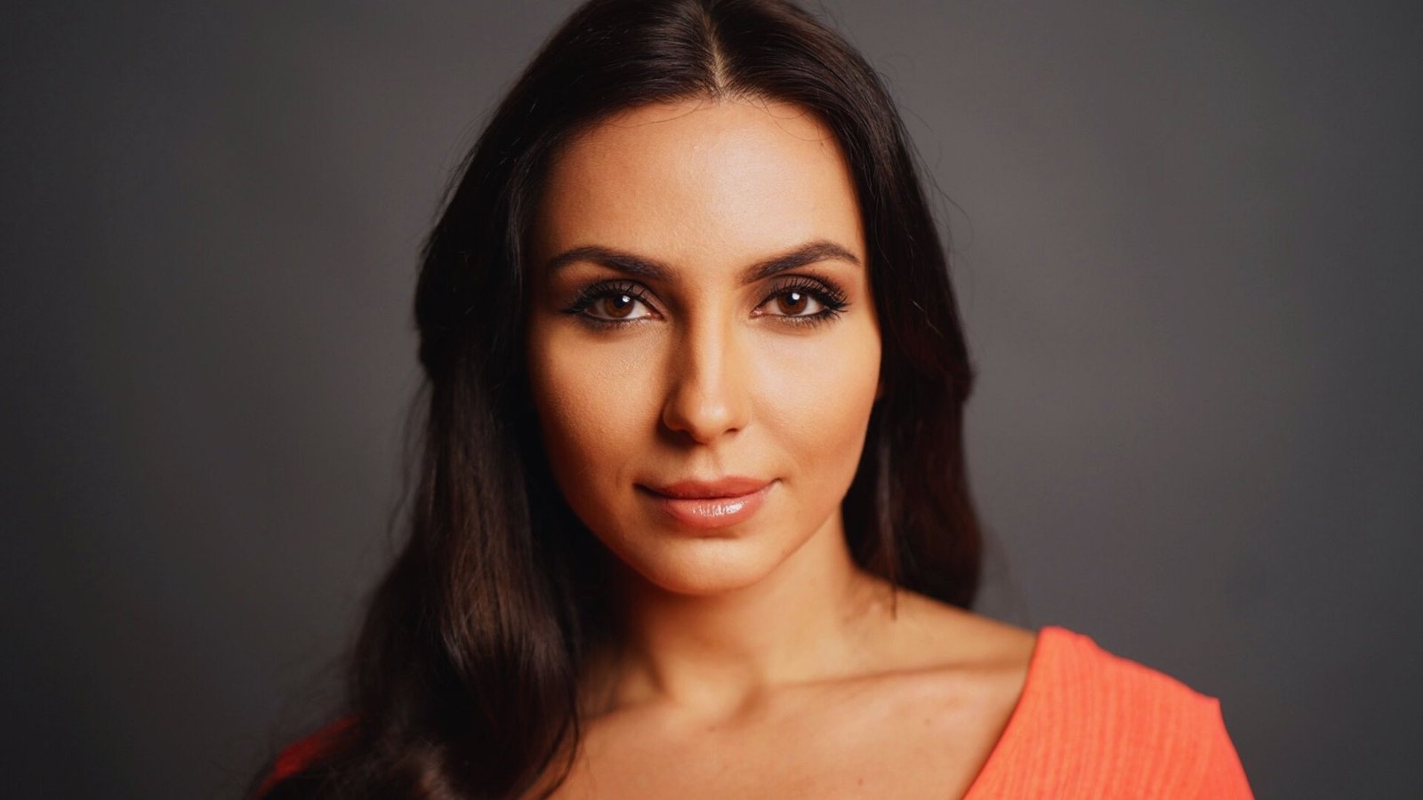 Bulgarian journalist, model, and author, excelling in storytelling through her insightful journalism, striking presence as a model, and captivating written works.